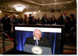 Vice President Dick Cheney, seen on a television monitor, receives a welcome Thursday, March 1, 2007, at the 34th Annual Conservative Political Action Conference in Washington, D.C.  White House photo by David Bohrer