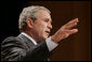 President George W. Bush gestures as he addresses his remarks to United States Hispanic Chamber of Commerce, speaking on Western Hemisphere policy, Monday, March 5, 2007 in Washington, D.C. President Bush, who travels to Latin America later this week, said the two regions are linked by common values, shared interests and growing ties that have helped advance peace and prosperity on both continents. White House photo by Paul Morse