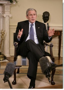 President George W. Bush speaks to members of the media during his meeting with former U.S. Sen. Bob Dole and former U.S. Health and Human Services Secretary Donna Shalala in the Oval Office, Wednesday, March 7, 2007. Dole and Shalala will co-chair the President’s Commission on Care for America’s Returning Wounded Warriors, a bipartisan panel that will investigate problems at the nation's military and veterans hospitals.  White House photo by Eric Draper