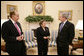 President George W. Bush meets with former U.S. Sen. Bob Dole and former U.S. Health and Human Services Secretary Donna Shalala in the Oval Office, Wednesday, March 7, 2007, who will co-chair the Presidents Commission on Care for Americas Returning Wounded Warriors.  White House photo by Eric Draper