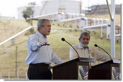 President George W. Bush and President Lula of Brazil discuss biofuel technology during a joint press conference at Petrobras Transporte S.A. Facility Friday, March 9, 2007, in Sao Paulo, Brazil. "And so I'm very much in favor of promoting the technologies that will enable ethanol and biodiesel to remain competitive, and therefore, affordable to the people in our respective countries and around our neighborhoods," said President Bush.  White House photo by Paul Morse