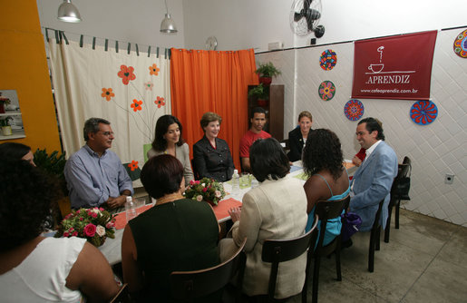 Mrs. Laura Bush talks with program participants of Projeto Aprendiz Friday, March 9, 2007, in Sao Paolo, Brazil. The organization has developed the concept of the neighborhood as a school, the program supplements school education with a wide range of community-based activities. The work carried out by Aprendiz has been recognized by UNICEF as a best practice project to be disseminated worldwide. White House photo by Shealah Craighead