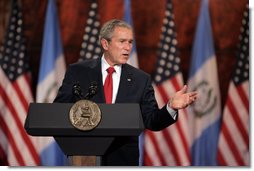 President George W. Bush delivers a point during a joint press availability Monday, March 12, 2007, with Guatemalan President Oscar Berger at the Palacio Nacional de la Cultura in Guatemala City. The President and Mrs. Bush joined the Bergers for dinner before departing Monday evening for Mexico. White House photo by Paul Morse