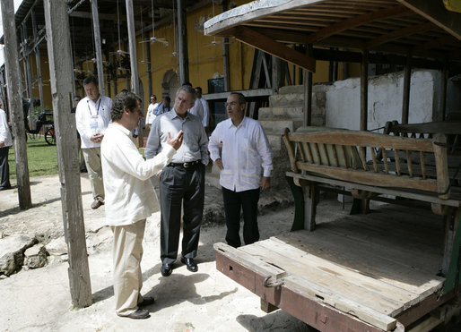 President George W. Bush and President Felipe Calderon of Mexico, right, are given a history of the Hacienda Temozon Tuesday, March 13, 2007, during a visit by the President and Mrs. Laura Bush. White House photo by Eric Draper