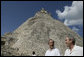 With the Pyramid of the Magician towering in the background, President George W. Bush and President Felipe Calderon of Mexico, tour the Mayan ruins of Uxmal Tuesday, March 13, 2007. White House photo by Eric Draper