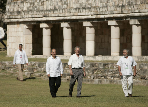 President George W. Bush and President Felipe Calderon walk amid the Mayan ruins of Uxmal Tuesday, March 13, 2007, during the visit by the President and Mrs. Laura Bush to Mexico. White House photo by Paul Morse