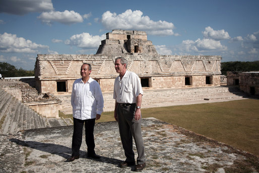 President George W. Bush and President Felipe Calderon of Mexico pause during a tour Tuesday, March 13, 2007, of the Uxmal, one of the most famous of the Mayan ruins. The President and Mrs. Laura Bush capped their five-day, Latin American visit with the stop in Mexico. White House photo by Paul Morse