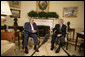 President George W. Bush talks with Iraqi Vice President Adil Abd Al-Mahdi, Thursday, March 15, 2007, during a meeting with the press in the Oval Office. "You, Mr. Vice President, are showing strong vision, and a vision of peace and reconciliation," said President Bush, adding, "And I welcome you to the Oval Office. I thank you for your courage, and I thank you for the conversation we've had." White House photo by Eric Draper
