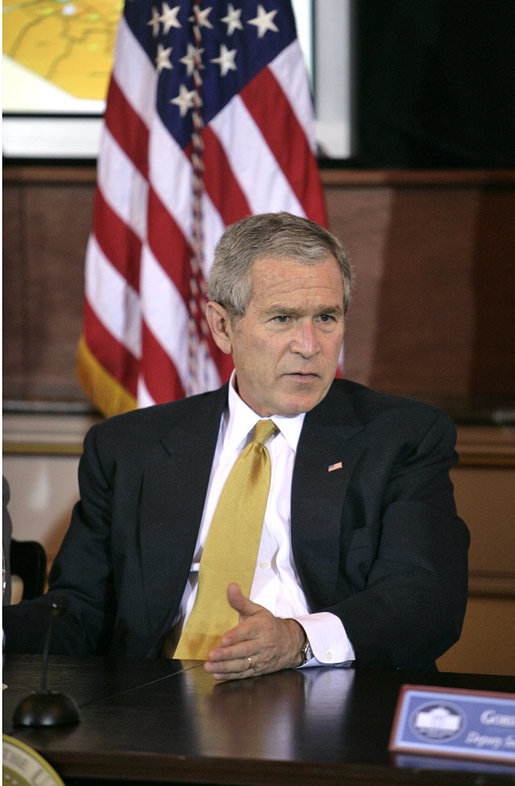 President George W. Bush takes part in a roundtable with Iraq provincial reconstruction team leaders in the Dwight D. Eisenhower Executive Office Building Thursday, March 22, 2007. "We don't want you to go into Iraq and then have unnecessary strings placed upon the money so you can't do your job," said the President to the press. "Congress needs to get their business done quickly, get the monies we've requested funded, and let our folks on the ground do the job." White House photo by Joyce Boghosian