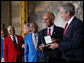 President George W. Bush presents the Congressional Gold Medal to Dr. Roscoe Brown Jr., during ceremonies honoring the Tuskegee Airmen Thursday, March 29, 2007, at the U.S. Capitol. Dr. Brown, Director of the Center for Urban Education Policy and University Professor at the Graduate School and University Center of the City University of New York, commanded the 100th Fighter Squadron of the 332 Fighter Group during World War II. White House photo by Eric Draper