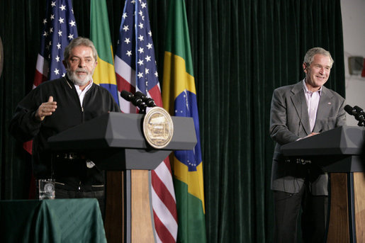 President George W. Bush listens as Brazilian President Luiz Inacio Lula da Silva answers a reporter’s question during their joint news conference Saturday, March 31, 2007, at Camp David. White House photo by Eric Draper