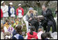 Children book authors Mary Pope Osborne and her husband Will Osborne read aloud to an ethusiastic crowd of young readers from her book, "American Tall Tales," Monday, April 9, 2007, during the 2007 White House Easter Egg Roll on the South Lawn. White House photo by Shealah Craighead