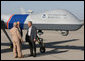 Standing next to a Predator Drone, Maj. Gen. Mike Kostelnik speaks with President George W. Bush and Secretary Michael Chertoff of Homeland Security during their tour Monday, April 9, 2007, of the U.S.-Mexico border in Yuma, Ariz. Said the President, "It's the most sophisticated technology we have, and it's down here on the border to help Border Patrol agents do their job." White House photo by Eric Draper