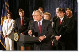 President George W. Bush emphasizes a point as he speaks on the Iraq War Supplemental during a visit to the American Legion Post 177 Tuesday, April 10, 2007, in Fairfax, Va. Said the President, "The bottom line is this: Congress's failure to fund our troops will mean that some of our military families could wait longer for their loved ones to return from the front lines. Others could see their loved ones headed back to war sooner than anticipated. This is unacceptable."  White House photo by Joyce Boghosian