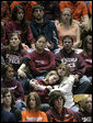 Students comfort each other during a Convocation on the Virginia Tech campus Tuesday, April 17, 2007, honoring the victims of a deadly shooting Monday. Thirty-three people, including the gunman, died in the rampage at the Blacksburg, Va. school. White House photo by Eric Draper