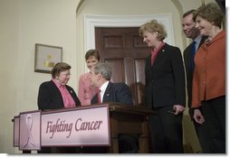 President George W. Bush shakes hands with Senator Barbara Mikulski (D-Md.), sponsor of H.R. 1132, the National Breast and Cervical Cancer Early Detection Program Reauthorization Act, after signing the bill Friday, April 20, 2007 in the Roosevelt Room of the White House. With them are, from right: Mrs. Laura Bush, Secretary Michael Leavitt of the Department of Health and Human Services, Wisconsin Congresswoman Tammy Baldwin, sponsor of the bill, and North Carolina Congresswoman Sue Myrick, co-sponsor of the bill.  White House photo by Shealah Craighead
