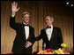 President George W. Bush joins White House Press Secretary Tony Snow at the head table for the White House Correspondents Association Dinner, Saturday evening, April 23, 2007 in Washington, D.C. White House photo by Shealah Craighead