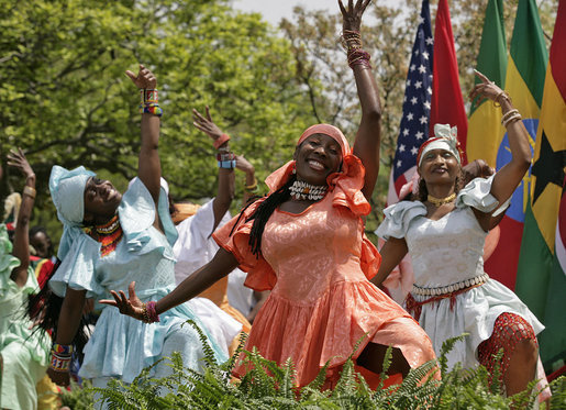 Members from the Kankouran West African Dance Company performs during a ceremony marking Malaria Awareness Day Wednesday, April 25, 2007, in the Rose Garden. White House photo by Eric Draper