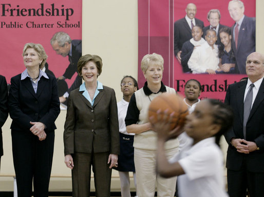 Mrs. Laura Bush, joined by Ambassador Karen Hughes left, and Linda Hargrove, general manager of the Washington Mystics, watches students playing basketball Wednesday, April 25, 2007, at the Friendship Public Charter School on the Woodridge Elementary and Middle School campus in Washington, D.C. Mrs. Bush visited the school to participate in Malaria Awareness Day events. White House photo by Shealah Craighead