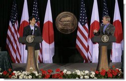 President George W. Bush and Japan's Prime Minister Shinzo Abe hold a joint press availability Friday, April 27, 2007, at Camp David.  White House photo by Joyce N. Boghosian