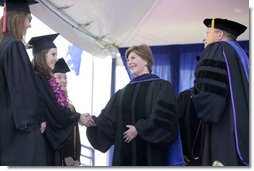 Mrs. Laura Bush congratulates the three Valedictorians of the 2007 graduating class at Pepperdine University's Seaver College Saturday, April 28, 2007, during commencement ceremonies on the Malibu, California campus. White House photo by Shealah Craighead