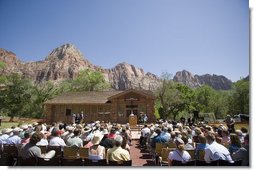 Mrs. Laura Bush delivers remarks, Sunday, April 29, 2007, during the rededication ceremony of the Zion National Park Nature Center in Springdale, Utah. "In Zion's peak season, the park welcomes 11,000 visitors a day," said Mrs. Bush. "They come for the sport of canyoneering. They come to learn about this park's abundant plant life -- from the Utah Beavertail Cactus to the Bigtooth Maple to the Pigsweed Shrub."  White House photo by Shealah Craighead