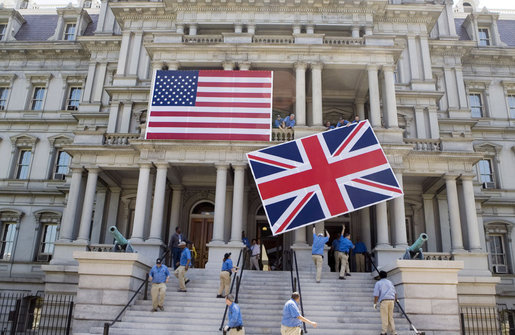 The Union Jack is raised next to the American flag Friday, May 4, 2007, at the Eisenhower Executive Office Building on the grounds of the White House in preparation for the visit Monday by Queen Elizabeth II and Prince Philip. White House photo by Lynden Steele