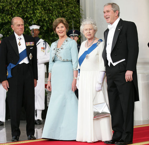 President George W. Bush and Mrs. Laura Bush welcome Her Majesty Queen Elizabeth II and His Royal Highness The Prince Philip, Duke of Edinburgh, Monday, May 7, 2007, upon their arrival to the North Portico of the White House for a State Dinner in their honor. White House photo by Eric Draper