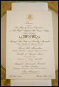 A menu is seen atop a table setting arrangement for the State Dinner at the White House Monday, May 7, 2007, hosted by President George W. Bush and Mrs. Laura Bush in honor of Her Majesty Queen Elizabeth II and His Royal Highness The Prince Philip, Duke of Edinburgh, in the State Dining Room. White House photo by Shealah Craighead
