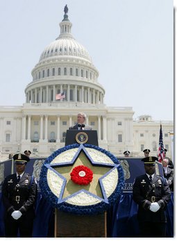 President George W. Bush addresses his remarks at the annual Peace Officers' Memorial Service outside the U.S. Capitol Tuesday, May 15, 2007, paying tribute to law enforcement officers who were killed in the line of duty during the previous year and their families. White House photo by Joyce Boghosian