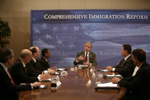 President George W. Bush participates in a roundtable discussion on comprehensive immigration reform and employment eligibility verification Wednesday, May 16, 2007, at the Embassy Suites Washington, D.C.-Convention Center. White House photo by Joyce Boghosian