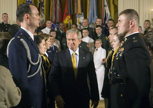 President George W. Bush attends a commissioning ceremony for Joint Reserve Officer Training Corps Thursday, May 17, 2007, in the East Room. "You come from different backgrounds; you represent all 50 states and the District of Columbia, as well as Guam, Puerto Rico, American Samoa and the U.S. Virgin Islands," said President Bush. "And when you leave here today, you will wear on your shoulders the same powerful symbol of achievement: the gold bars of an officer of the United States Armed Forces." White House photo by Joyce Boghosian