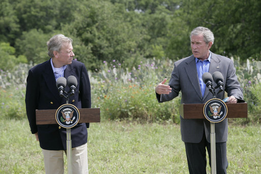 President George W. Bush gestures during a joint press availability Monday, May 21, 2007, with NATO Secretary-General Jaap de Hoop Scheffer at the Bush Ranch in Crawford, Texas. White House photo by Eric Draper