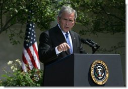 President George W. Bush emphasizes a point as he responds to a question Thursday, May 24, 2007, during a press conference in the Rose Garden of the White House.  White House photo by Joyce Boghosian