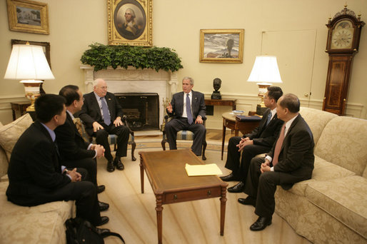 President George W. Bush meets with Vietnamese democracy and human rights activists Tuesday, May 29, 2007, in the Oval Office of the White House. White House photo by Joyce Boghosian