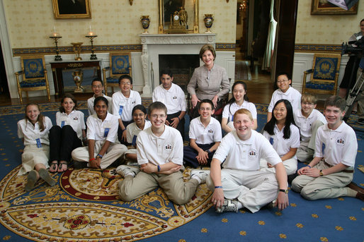 Mrs. Laura Bush meets with the 15 Scripps National Spelling Bee Championship finalists during an ABC television taping at the White House Thursday, May 31, 2007, to be aired on ABC during the final round Thursday evening. From left to right are Tia Natasha-Elizabeth Thomas of Coarsegold, Calif.; Isabel A. Jacobson of Madison, Wis.; Joseph Henares of Avon, Conn.; Cody Wang of Alberta, Canada; Nithya P. Vijayakumar of Canton, Mich.; Kavya Shivashankar of Olathe, Kansas; Prateek Kohli of Westbury, N.Y.; Jonathan Horton, front-left center, of Gilbert, Ariz.; Evan M. O'Dorney, center, of Danville, Calif.; Connor W. Spencer, front-right center,of Platte City, Mo.; Amy Chyao, back-row next to Mrs. Bush, of Richardson, Texas; Claire Zhang of Jupiter, Fla.; Anqi Dong, upper-right, of Saskatoon, Saskatchewan, Canada; Nate Gartke , center far-right, of Spruce Grove, Alberta, Canada; and Matthew Evans, far-right, of Albuquerque, N.Mex. White House photo by Shealah Craighead