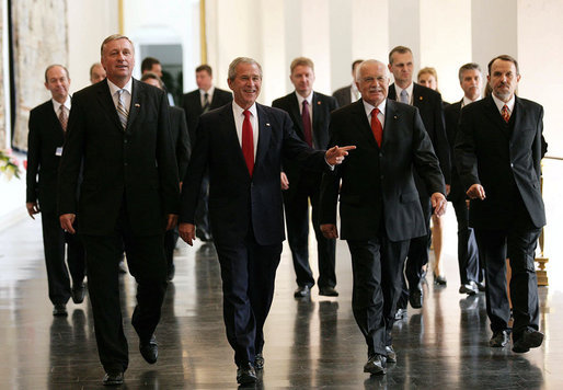 President George W. Bush walks with Czech Republic Prime Minister Mirek Topolanek, right, and President Vaclav Klaus Tuesday, June 5, 2007, during a visit to Prague Castle in Prague, Czech Republic. "It is fitting that we meet in the Czech Republic -- a nation at the heart of Europe, and of the struggle for freedom on this continent," said President Bush in his remarks. "Nine decades ago, Tomas Masaryk proclaimed Czechoslovakia's independence based on the 'ideals of modern democracy'." White House photo by Eric Draper