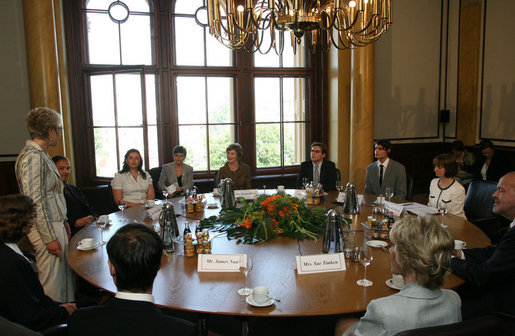 Mrs. Laura Bush listens to Sylvia Bretschneider, President of the State Parliament, during a roundtable discussion Wednesday, June 6, 2007, with Fulbright Scholars at the Schwerin Castle in Schwerin, Germany. Established in 1946, more than 279,000 scholars have participated in the program worldwide. White House photo by Shealah Craighead