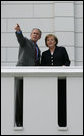 President George W. Bush and German Chancellor Angela Merkel stand on a balcony at the Kempinski Grand Hotel Wednesday, June 6, 2007, in Heiligendamm, Germany, site of the 2007 G8 Summit. White House photo by Eric Draper