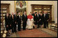 Pope Benedict XVI stands with President George W. Bush and Mrs. Laura Bush and members of the official U.S. delegation Saturday, June 9, 2007, during their visit to The Vatican. White House photo by Eric Draper