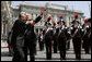 Italy's Prime Minister Romano Prodi points to someone in the courtyard audience as he welcomes President George W. Bush to Chigi Palace Saturday, June 9, 2007. The President and Mrs. Bush are scheduled to depart Rome Sunday for Albania and Bulgaria. White House photo by Chris Greenberg
