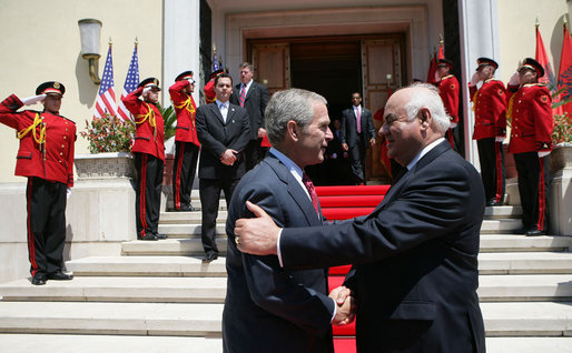President George W. Bush and President Alfred Moisiu of Albania shake hands as President Bush departs the Palace of Brigades in Tirana, Albania Sunday, June 10, 2007. White House photo by Eric Draper