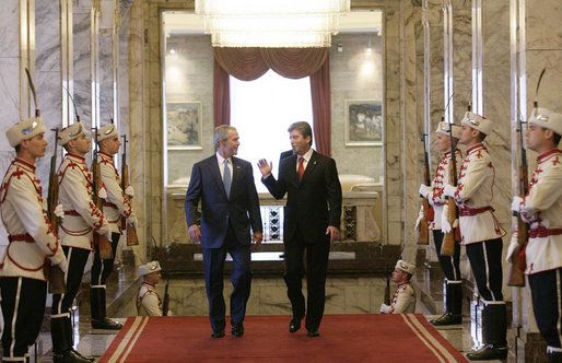President George W. Bush and Bulgarian President Georgi Parvanov arrive for their meeting at the Coat of Arms Hall in Sofia, Bulgaria, Monday, June 11, 2007. White House photo by Eric Draper