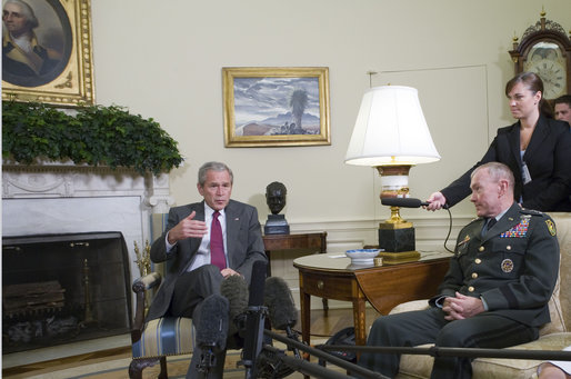 President George W. Bush meets with Lt. Gen. Martin E. Dempsey, former Commanding General of Multi-National Security and Transition Command - Iraq, in the Oval Office Thursday, June 14, 2007. The President thanked the general for his leadership saying, "It's an extraordinary country where people volunteer to go into combat zones, to protect the security of the United States of America. And we appreciate you, and thank you, and wish you all the best in your next assignment." White House photo by Joyce N. Boghosian