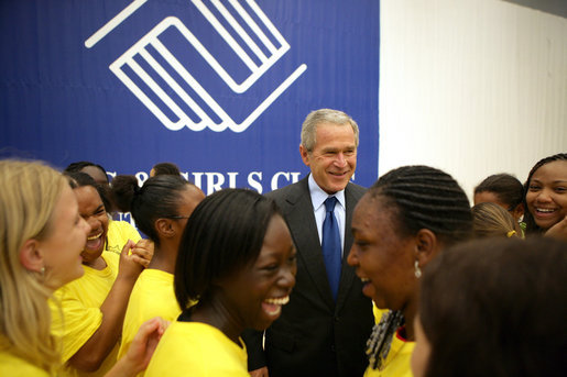 President George W. Bush is surrounded by kids at the Boys and Girls Club of South Central Kansas - 21st Street during his stop Friday, June 15, 2007, in Wichita. Said the President, "I think it's very important for the people of Wichita to support a program such as this -- after all, we can change our country one heart and one soul at a time. And I'm really pleased to be here." White House photo by Eric Draper