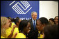 President George W. Bush is surrounded by kids at the Boys and Girls Club of South Central Kansas - 21st Street during his stop Friday, June 15, 2007, in Wichita. Said the President, "I think it's very important for the people of Wichita to support a program such as this -- after all, we can change our country one heart and one soul at a time. And I'm really pleased to be here." White House photo by Eric Draper