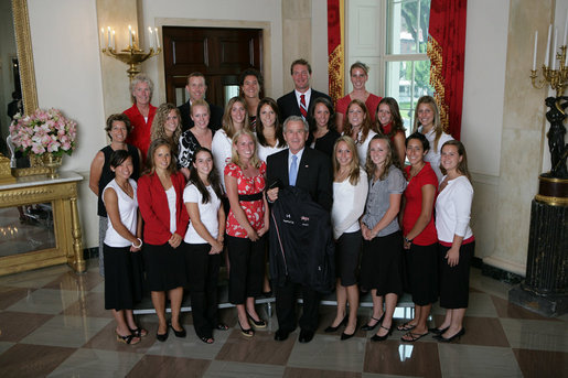 President George W. Bush stands with members of the University of Maryland Women's Field Hockey 2006 Championship Team Monday, June 18, 2007 at the White House, during a photo opportunity with the 2006 and 2007 NCAA Sports Champions. White House photo by Eric Draper