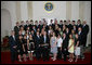 President George W. Bush stands with members of the Penn State Men's and Women's Fencing 2007 Championship Team Monday, June 18, 2007 at the White House, during a photo opportunity with the 2006 and 2007 NCAA Sports Champions. White House photo by Eric Draper