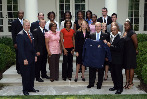 President George W. Bush stands with members of the Auburn University Women's Outdoor Track and Field 2006 Championship Team Monday, June 18, 2007 at the White House, during a photo opportunity with the 2006 and 2007 NCAA Sports Champions. White House photo by Chris Greenberg