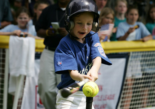 The tongue is out as the swing is swung during an at bats for a Bobcat from Cumberland, Maryland Wednesday, June 27, 2007, against the Luray, Virginia Red Wings on the South Lawn. The game marked the opening of the 2007 White House Tee Ball season. White House photo by Eric Draper